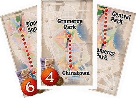 Close-up view of three game cards from Ticket to Ride: New York by Days of Wonder. The cards feature illustrated map sections highlighting notable locations like Times Square, Gramercy Park, Chinatown, and Central Park, with routes marked in red and numbers indicating points.