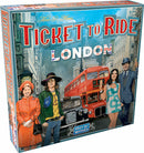Ticket to Ride: London board game box featuring vibrant artwork. The cover depicts four characters against the backdrop of iconic London landmarks, including a red double-decker bus and historic buildings. The title is prominently displayed at the top, with the manufacturer's logo visible at the bottom.