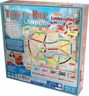 The back of the Ticket to Ride: London board game box by Days of Wonder. The design features a colorful map of London with various routes marked in different colors. There are illustrations of iconic London landmarks and transportation elements, along with descriptions of game components and instructions. A vintage style London bus is prominently displayed, inviting players to explore the city. The tagline 'This is London calling!' highlights the theme of the game.