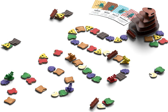 A vibrant board game titled 'Bites' by Allplay, featuring various colorful food-shaped pieces scattered across a white surface. The game includes cards displayed in the background, showcasing playful game mechanics involving collecting and stacking food items.