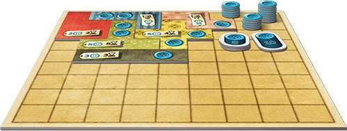 A vibrant game board for Patchwork by Lookout Games, showcasing colorful fabric pieces in various shapes and sizes, and blue buttons stacked on the side. The grid layout highlights the gameplay mechanics of tile placement and strategy, creating an engaging visual appeal for board game enthusiasts.