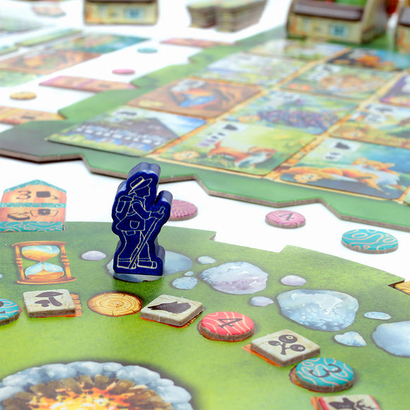 A colorful board game titled 'Meadow' by Rebel, featuring a blue game piece on a vibrant green landscape board. The game board is adorned with various tiles depicting animals and nature, alongside different tokens used for gameplay. This engaging game emphasizes strategy and exploration.