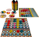 Azul: Stained Glass of Sintra board game from NEXT MOVE GAMES featuring colorful glass tiles, player boards with scoring areas, and a decorative scoring tower. The game setup includes vibrant glass pieces in multiple colors and player mats for individual gameplay.