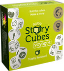 Rory's Story Cubes Voyages game box featuring various illustrated dice icons. The bright green background includes the product name, a tagline about rolling cubes to create stories, and features symbols like an elephant, a pirate skull, and a telescope. It highlights the game’s international acclaim with various award badges.