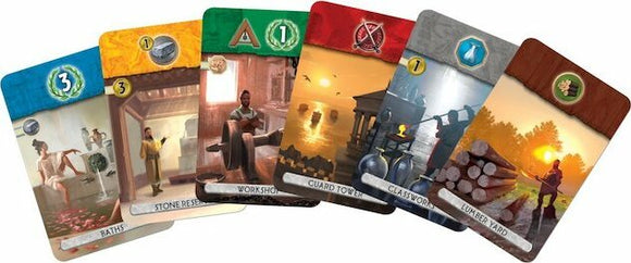 A collection of five beautifully illustrated game cards from the 7 Wonders Duel card game by Asmodee. The cards feature vibrant artwork depicting historical settings and activities, such as baths, workshops, and guard towers, each with unique symbols and numerical values indicating resources and strategic elements.