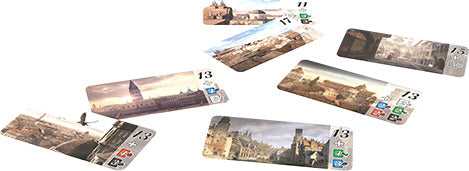 An assortment of game cards from 'Splendor: Cities of Splendor' featuring beautiful illustrations of European city skylines and landmarks. Each card is numbered, with some showcasing iconic structures and scenic views, designed for strategic gameplay.