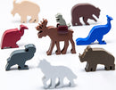 An assortment of colorful animal figures from the Everdell Spirecrest Expansion. Includes a moose with a rider, a blue dinosaur, and various other stylized animals in different colors, enhancing gameplay.