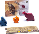 Everdell Spirecrest Expansion game components, including colorful wooden critter tokens like a red dinosaur and an orange squirrel, alongside an instruction card featuring a large bird and illustrations of two forest locations.