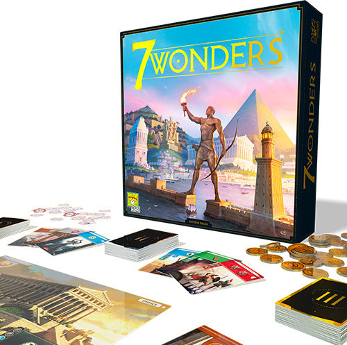 7 Wonders board game by Repos, featuring a colorful box with an illustration of a torch-bearing statue and ancient architecture. The game components include various cards, coins, and a game board, laid out on a table for easy access during play.