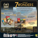 Back cover of the board game '7 Wonders' by Repos. The game features vibrant illustrations and details on how to play. Players can lead one of the seven great cities of Antiquity, focusing on strategy to expand their city through card selection. The packaging highlights the number of players, age recommendation, and playtime of approximately 30 minutes.