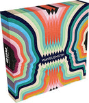 Wavelength game by Palm Court, featuring a vibrant box design with colorful waves and stylized human faces. The game promotes connection and communication among players, challenging them to find the right wavelength in a fun and engaging way.