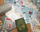 Pandemic Legacy: Season 0 board game by Z-Man. Features a detailed game board with a world map, various player pieces in red and blue, cards, and a locked box labeled '0001'. Game elements include action cards, objectives, and intelligence reports, creating a strategic and immersive gameplay experience. Perfect for fans of cooperative games.