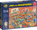 Jigsaw puzzle titled 'The Magic Fair' by Jan Van Haasteren, featuring a vibrant and colorful comic scene with numerous characters engaged in various activities at a fair. The puzzle includes 1000 pieces and is packaged in a detailed box showcasing the intricate artwork.