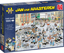 A colorful and whimsical jigsaw puzzle box titled 'Cattle Market' by Jan van Haasteren. The illustration features a bustling cattle market scene filled with animals and humorous characters, showcasing various activities and interactions amidst a lively crowd. It's a 1000-piece comic puzzle that promises fun and entertainment for puzzle enthusiasts.