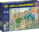 The Art Market jigsaw puzzle by Jumbo, featuring a vibrant comic illustration of an art market with numerous characters engaging in various artistic activities, showcasing a colorful setting filled with artwork and sculptures. The box displays the name of the puzzle and a depiction of the completed scene.