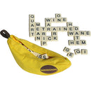 Bananagrams game featuring a bright yellow banana-shaped pouch filled with letter tiles scattered around it. The tiles are arranged to form various words, showcasing the fun and interactive nature of the game.