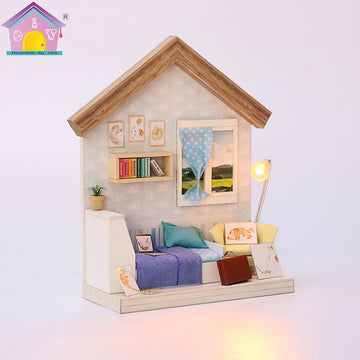 A detailed DIY photo frame kit named 'Blueberry Soda'. It features a miniature living room scene with a cozy couch, bookshelves, decorative pictures, and a floor lamp. Perfect for craft enthusiasts looking to create a charming display.