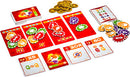 A vibrant board game set from Blue Orange U.S.A., featuring colorful cards and tokens. The setup includes red game cards with different values, colorful tokens, and scoring cards, all arranged on a white background. Ideal for family game nights and social gatherings.