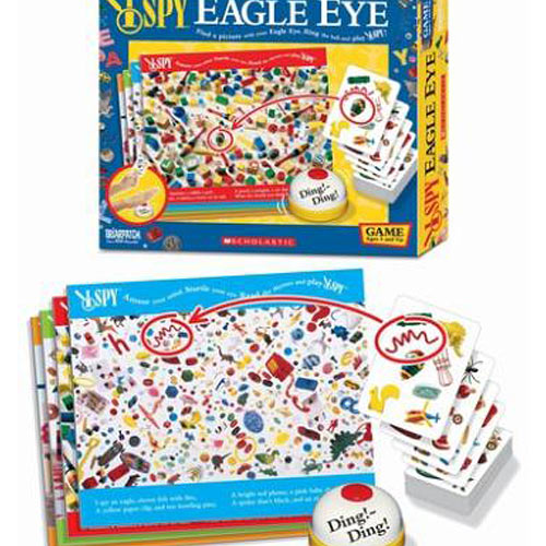 I Spy Eagle Eye game by Briarpatch Inc. features a colorful game box displayed alongside game cards and a play mat covered in various objects. Players will find hidden items and use the 'Ding! Ding!' bell in the game for added excitement.