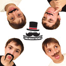 A playful image featuring four young boys wearing various fake mustaches and showcasing fun expressions. The Mr. Moustachio logo is prominently displayed in the center, featuring a top hat and iconic mustaches, celebrating the 10 Manliest Mustaches of All Time. The bright white background enhances the cheerful and humorous vibe of the product.