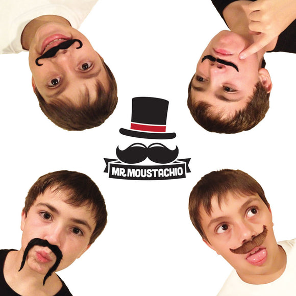 A playful image featuring four young boys wearing various fake mustaches and showcasing fun expressions. The Mr. Moustachio logo is prominently displayed in the center, featuring a top hat and iconic mustaches, celebrating the 10 Manliest Mustaches of All Time. The bright white background enhances the cheerful and humorous vibe of the product.
