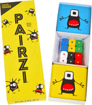 PAIRZI game by Tenzi features a bright yellow box adorned with playful monster graphics. Inside, there are colorful dice and game cards, inviting players to engage in a fun and interactive experience.