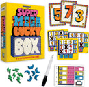 The Super Mega Lucky Box game by Gamewright features a colorful box design. Inside, there are numbered cards, score sheets, and game pieces including green lightning bolts and blue crescent shapes. A black dry-erase marker is also included for tallying points. The game emphasizes fun and strategy for all ages.