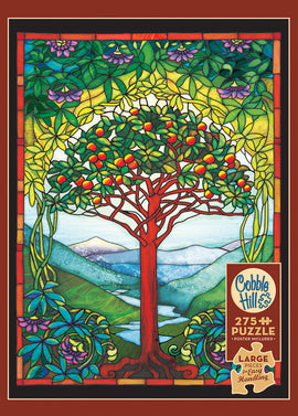 Tree of Life Stained Glass jigsaw puzzle by Cobble Hill, featuring 275 large pieces. The design showcases a vibrant tree with colorful fruits and a backdrop of mountains and foliage, suitable for easy handling. Comes with a poster.