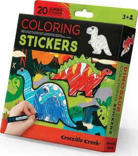 A colorful package of Dinosaur Coloring Stickers by Crocodile Creek, featuring 20 jumbo stickers and 5 crayons. A hand is shown coloring a blue dinosaur sticker, surrounded by vibrant jungle foliage.
