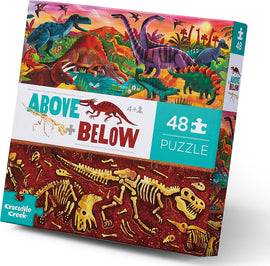 Above & Below Dinosaur World jigsaw puzzle by Crocodile Creek, featuring vibrant illustrations of dinosaurs and a detailed scene of dinosaur fossils, designed for ages 4 and up.