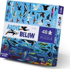 Crocodile Creek jigsaw puzzle titled 'Above & Below', featuring vibrant illustrations of birds in the sky and sea creatures underwater. The box contains 48 pieces for ages 4 and up, showcasing a mix of life above and below the water's surface.