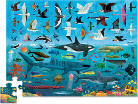 A colorful 48-piece jigsaw puzzle titled 'Above & Below - Sea and Sky' by Crocodile Creek. The illustration features various marine life such as sharks, octopuses, and fish, along with different bird species flying above the ocean. The background showcases a vibrant blue sea and sky with elements of underwater habitats like coral reefs and sea plants.