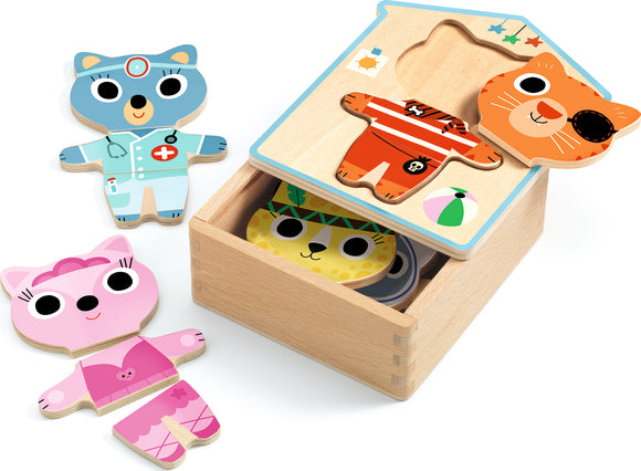 DJECO Dressup-Mix is a colorful mix-and-match wooden puzzle featuring cute animal characters. Includes a blue bear in a doctor's outfit, a pink cat in a dress, and an orange cat as a pirate. The puzzle pieces fit into a charming wooden storage box with a lid that showcases the character designs. Perfect for imaginative play and developing fine motor skills.