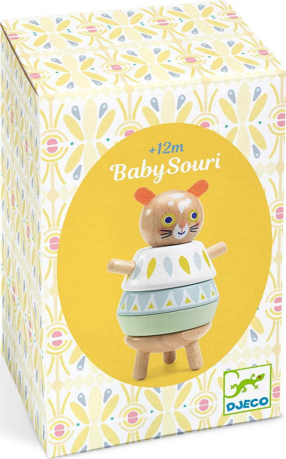 A colorful wooden stacking toy called BabySouri by DJECO, featuring a cheerful animal design with movable parts. The toy is packaged in a decorative box with floral patterns, suitable for children aged 12 months and up.