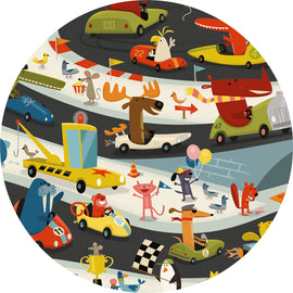 A colorful jigsaw puzzle featuring a lively automobile rally scene filled with cartoon animals driving various vehicles. There are cars racing along a winding track, with a moose, a monkey, and a dog among the participating characters. The scene is animated and playful, showcasing a vibrant and festive atmosphere with flags, balloons, and cheering spectators.