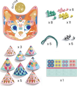 DJECO Kitty Carillons Wind Chimes DIY kit featuring a colorful cat-shaped base with glitter, various beads in green, yellow, pink, and silver bells. Includes beautifully designed colorful cones and embellishments for craft creation.