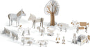 The DJECO Farm Color. Assemble. Play is a DIY kit featuring various farm animals and trees made from cardboard. Includes a horse, cow, sheep, goat, chicken, and decorative fences, encouraging creative play and assembly.