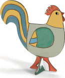 A colorful DIY kit from DJECO titled 'Farm Color. Assemble. Play.' features a rooster shaped cutout with vibrant hues including blue, yellow, green, and red. Perfect for creative hands-on play, this unique kit engages children in assembling their own farm-themed character, enhancing fine motor skills and imaginative abilities.