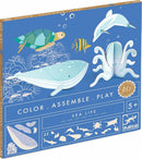 A colorful DIY kit titled "Sea Life - Color. Assemble. Play." by Djeco. The box features illustrations of various sea creatures including a whale, dolphin, turtle, and octopus, designed for children aged 5 and up. Promotes creativity and hands-on play through assembling and coloring marine life figures.