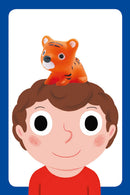 The Little Action Little Game by DJECO features a playful design with a smiling young boy and an adorable orange tiger figure perched on his head. This engaging game is perfect for sparking imagination and creativity in children, inviting them to participate in fun activities.
