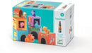 Topanifarm by DJECO is a colorful stacking game featuring playful animals. The box displays various animal figures such as cows, pigs, and rabbits, and vibrant houses in a playful layout. Ideal for children aged 18 months and older.