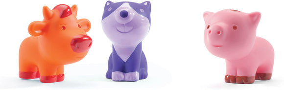A colorful trio of animal figurines featuring an orange cow, a purple wolf, and a pink pig. Each figure is made of soft, squeezable material, perfect for children's playtime or as fun decorative items.