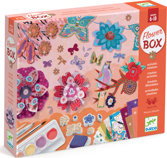 The Flower Garden Multi-Activity Craft Kit by Djeco features a colorful box filled with creative materials. It includes a variety of butterflies, flowers, and fun embellishments, perfect for ages 6-10. The kit is designed for children to unleash their creativity through fun hands-on activities, including painting and crafting.