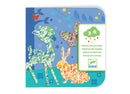 The Colorful Parade Marble Painting Kit by DJECO features a vibrant design with deer, rabbits, and butterflies. This DIY kit is ideal for children aged 3-6, encouraging creative artistic expression using marbles to create colorful patterns.