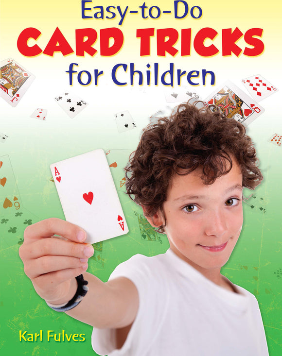 A young boy holding up an Ace of Hearts playing card, smiling at the camera. The background features floating playing cards and the title 'Easy-to-Do Card Tricks for Children' in bold, colorful letters. The cover is designed by Dover Publications.