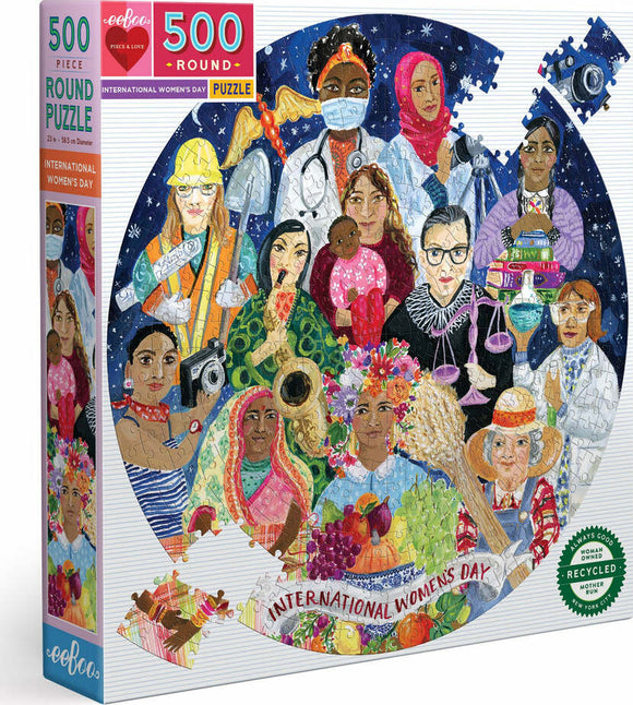A vibrant 500-piece round jigsaw puzzle titled 'International Women's Day' by Eeboo. The puzzle features diverse women from various professions and cultures, surrounded by symbols of empowerment and community, celebrating women's contributions to society.