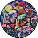 Round jigsaw puzzle featuring a vibrant array of colorful butterflies and moths set against a dark night sky with stars and moon. The intricate design showcases detailed illustrations of various species surrounded by blooming flowers, creating a captivating and enchanting scene for puzzle enthusiasts.