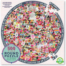 500-piece round jigsaw puzzle titled 'Women March!', featuring a colorful collage of women holding signs advocating for women's rights, equality, and social justice. Prominent phrases include 'My Body, My Choice', 'Diversity is Great', and 'Love Trumps Hate'. The design promotes activism and unity, showcasing a vibrant array of characters and messages surrounding the U.S. Capitol.