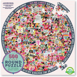 500-piece round jigsaw puzzle titled 'Women March!', featuring a colorful collage of women holding signs advocating for women's rights, equality, and social justice. Prominent phrases include 'My Body, My Choice', 'Diversity is Great', and 'Love Trumps Hate'. The design promotes activism and unity, showcasing a vibrant array of characters and messages surrounding the U.S. Capitol.