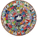 A circular jigsaw puzzle titled 'Votes for Women' by Eeboo. The puzzle features portraits of historical women who fought for suffrage, arranged in colorful segments around a central image of a woman on a unicorn. Each segment displays a portrait along with a name or quote, celebrating key figures in the women's rights movement.